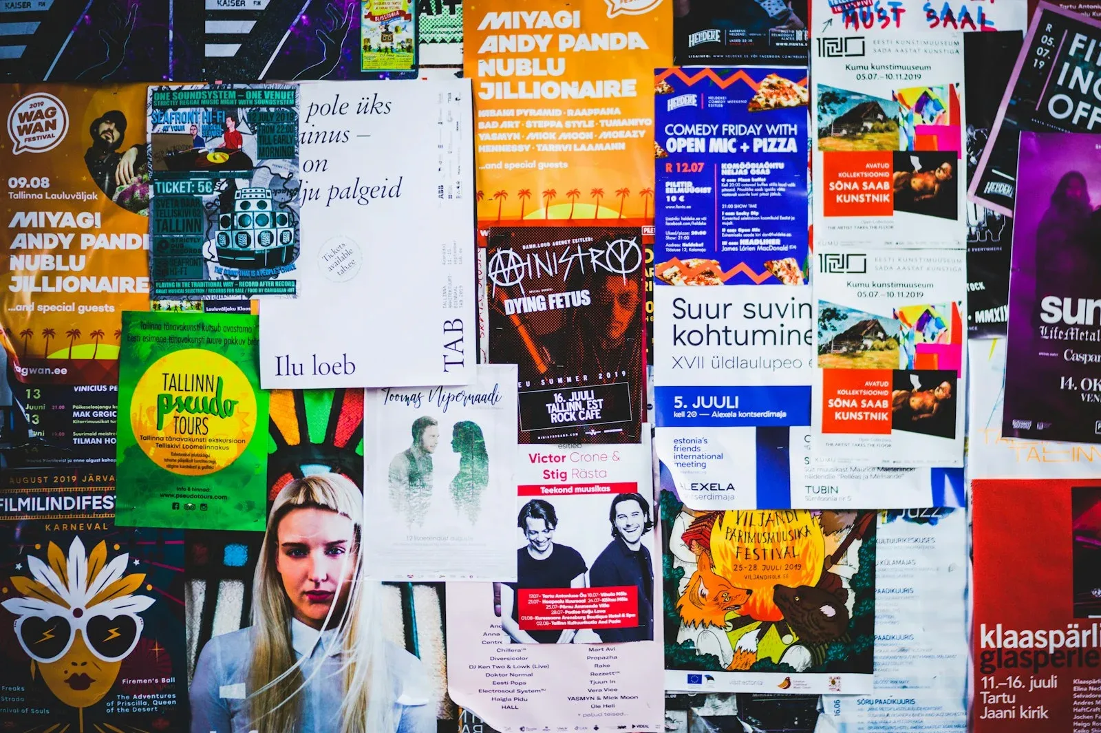 Colourful posters arranged across a wall